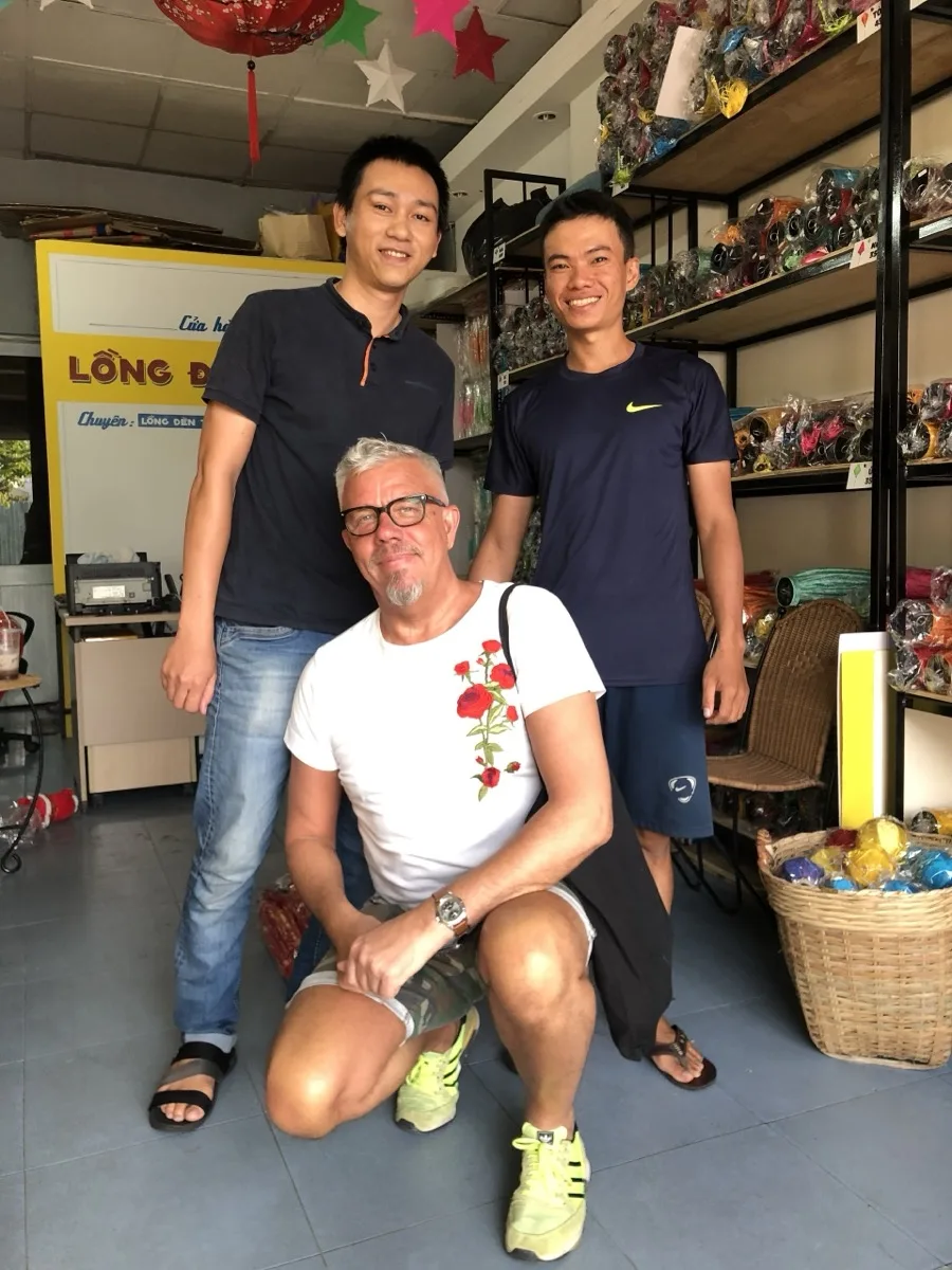 Foreign tourist shopping Vietnamese lanterns Ho Chi Minh City